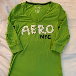 Green aero half sleeved shirt.